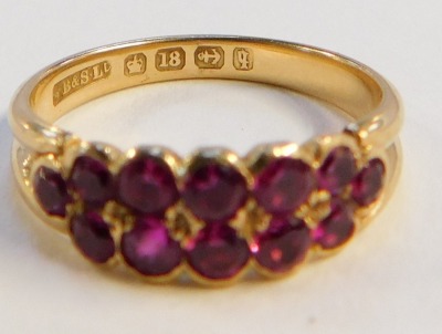 A Victorian 18ct gold garnet dress ring, London 1890, size O 1/2, 3.7g all in. - 2