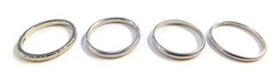 Four various platinum wedding bands, 12.1g.