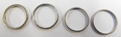 Four various platinum wedding bands, 12.1g. - 2