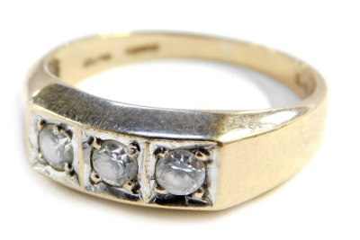 A 9ct gold gentleman's three stone diamond ring, set with three old cut diamonds, each approx 0.12cts, size U, 3.2g all in.