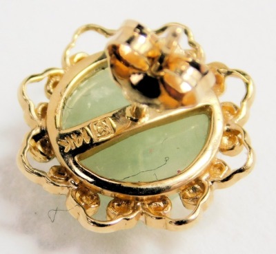 A pair of Chinese jadeite set ear studs, yellow metal, within pierced scroll borders, stamped China 14k, yellow metal ring set with a cultured pearl, stamped 585, 4.6g all in, and a yellow metal wedding band, indistinct marks, 3.7g. (3) - 4