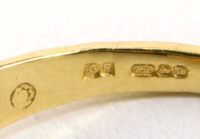 A modern 18ct gold leopard ring, fashioned as a head and legs of a leopard, in a leaping pose, set with numerous peridots, size N, 4.0g all in. - 3