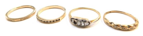 Four various 9ct gold dress rings, 6.7g all in.