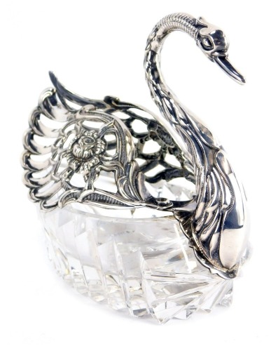 A 20thC cut glass and silver salt dish, of swan form, with hinged pierced wings marked 925, 10cm high.