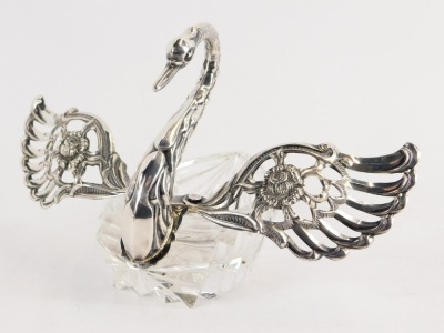 A 20thC cut glass and silver salt dish, of swan form, with hinged pierced wings marked 925, 10cm high. - 2