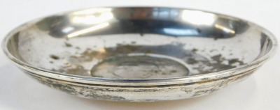 An Elizabeth II silver dish, of circular form inset with a commemorative Churchill 1965 crown, hallmarks rubbed, 2.57oz all in, 10cm diameter, together with a silver candle snuffer with turned handle, Birmingham 1968. - 3