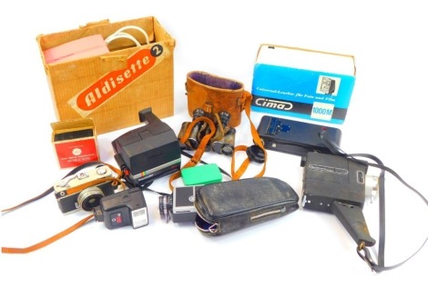 A group of cameras and optics, to include a Konica C35 camera, leather cased binoculars, a number 2A folding Autographic Brownie camera, etc. WARNING! This lot contains untested or unsafe electrical items. It is supplied for scrap or re-conditioning onl