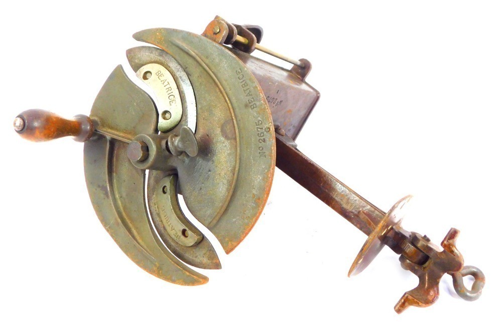 A Beatrice number 2675 cast metal meat slicer