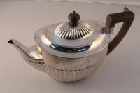 A Victorian silver oval teapot by Walter & John Barnard