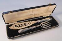 A set of mid Victorian silver fish servers by John Gammage