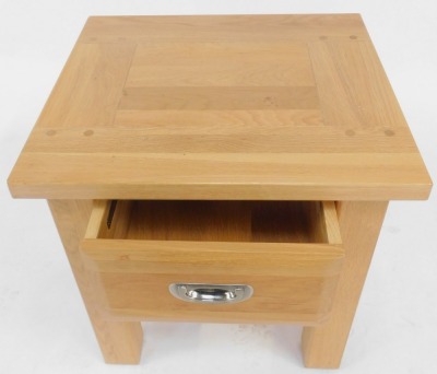 A Willis and Gambier oak bedside table, with frieze drawer, on stiles, 51cm high, 50cm wide, 44cm deep. - 2