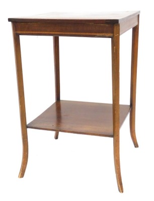 An Edwardian mahogany two tier occasional table, the square top with inlaid decoration, raised on slender square outswept legs, united by an under tier 72cm high, 45cm wide, 45cm deep.