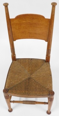 A pair of early 19thC oak and rush seated country chairs, 43cm wide. - 2