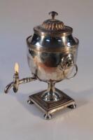 A late 19thC Sheffield plate samovar with ivory tap handle on square plinth and bun feet