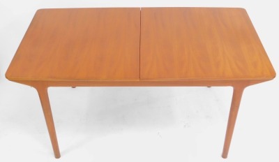 A mid century McIntosh teak draw leaf dining table, raised on turned legs, 74cm high, 160cm wide, 236cm extended, 91.5cm deep. - 2