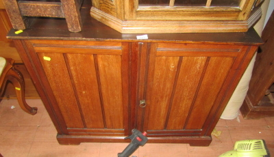 A 20thC walnut two door cabinet, 74cm high, 91cm wide, 56cm deep.