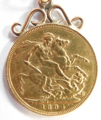 A Victorian gold sovereign 1894, with applied pendant mount and unmarked yellow metal curb necklace, 39.6g all in. - 2