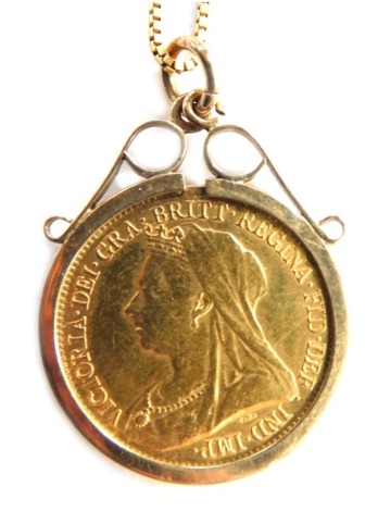 A Victorian gold half sovereign 1893, in spring pendant mount and yellow metal box link chain, marked 375 Italy, 7.3g all in.