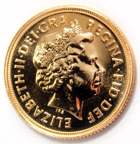 An Elizabeth II full gold sovereign, dated 2006.