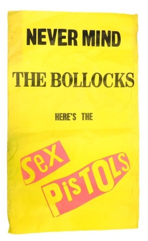 After Jamie Reid (1947-2013). Never Mind the Bollocks Here's the Sex Pistols, advertising poster, on a yellow backing with black and pink print, 151cm x 91cm. (AF) Provenance by Repute: Believed to be from 6th December Leeds Pollytech show