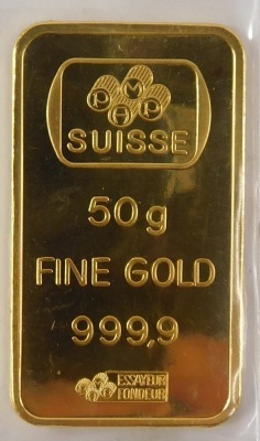 A Saudi Arabian fine gold ingot, the front displayed with lady with cornucopia of coins, the reverse marked Pmap Suisse 50g Fein Gold 999.9 chiasso, in plastic sealed case. - 2