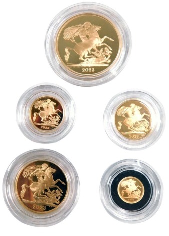 A Royal Mint The Sovereign cased sovereign set, comprising five pound, two pound, full, half, and quarter sovereign set for 2023, in mahogany presentation pack, with certificate, boxed. (5)