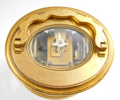 A 19thC carriage clock, with gilded border over a white enamel Roman numeric face plate with seconds dial, with a thirty hour keywind movement, with oval bevelled plates, 13cm high. - 2