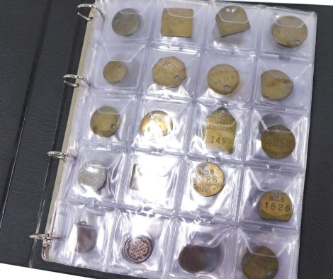 A group of coins, tokens and medallions, to include locker tokens, regular attendance badges, Coronation medal, shield fobs, German war crests, 1910 award medal, South Africa pin badge, St Johns Ambulance badge, some with enamel decoration, mother of pear