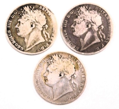 Three George III silver half crowns, comprising 1820, 1823 and 1821, 40.6g all in. (3) - 2