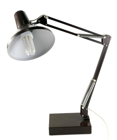 An Anglepoise type lamp, in brown and cream, on a rectangular base, the base 20cm wide. WARNING! This lot contains untested or unsafe electrical items. It is supplied for scrap or re-conditioning only. TRADE ONLY