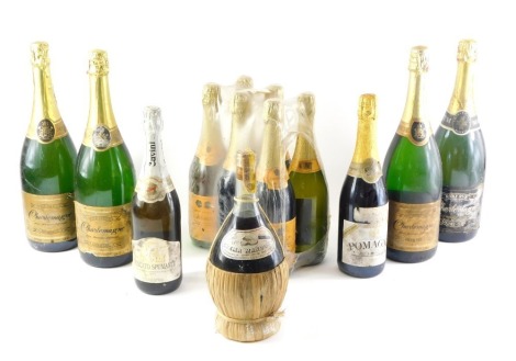 Various bottles of sparkling wine, and a bottle of Italian Crema Mandorla, etc. (AF)