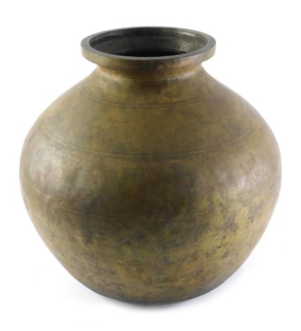 A large Indian globular brass vase, with inscribed band to border, 46cm high.