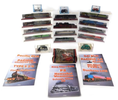 A collection of Atlas Editions diecast locomotives, each with original packaging, a VW Golf, Polo, etc.