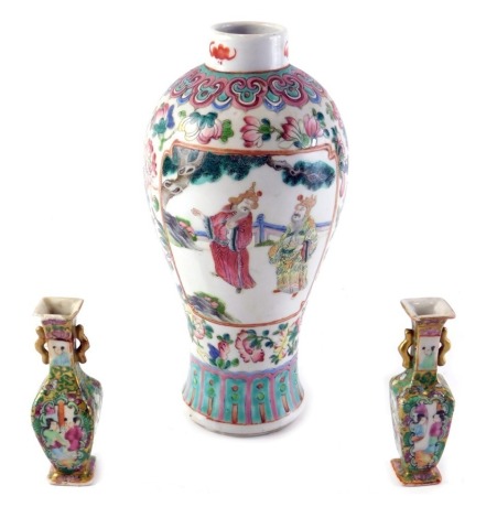 A late 19th/early 20thC Chinese famille rose baluster shaped vase, decorated with figures, 26cm high, and a pair of miniature 19thC Canton two handled porcelain vases, 11cm high (AF).