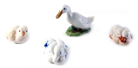 Two pairs of Royal Copenhagen ducklings, one decorated in blue, a duck numbered 1192, and a chick 605 respectively. (4)