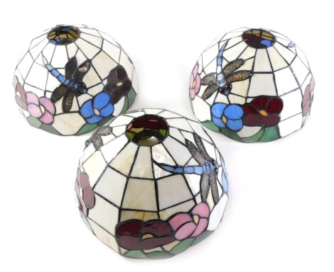 A set of three Tiffany style stained glass shades, 22cm diameter.