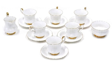 A Royal Albert Val D'Or pattern part tea service, comprising milk jug, sugar bowl, six cups and saucers.