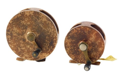 A Cambridge Trinity Hardings small fly fishing reel, 8cm diameter, and a similar Cambridge Pembroke fishing reel, 10cm diameter. (2)