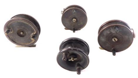 A collection of brown Bakelite fishing reels, to include Allcocks Aerialite. (4)