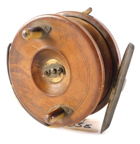 An early 20thC Hardy's Patent fishing reel, with silver plated mounts and horn handles, 12cm diameter.