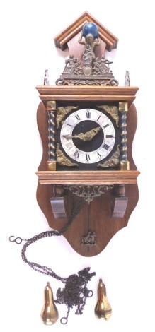 A Dutch mahogany wall clock, with gilt metal mounts of atlas, etc. 49cm high.