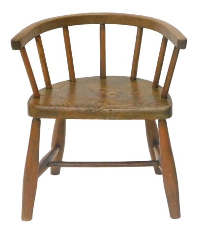 An ash and elm child's Windsor captain's style chair, on turned legs with H stretcher.