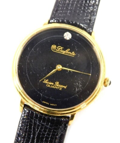 A Lucian Picard Dufonte lady's wristwatch, with black circular dial inset with diamond at '12', quartz movement, on leather strap, boxed.