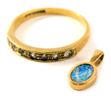 Two items of jewellery, comprising a crushed opal set pendant in yellow metal stamped 585, and a 9ct gold half hoop eternity dress ring, ring size Q½, 2.7g all in. (2)