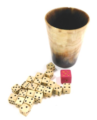 A horn dice beaker and contents of stained miniature dice, 6cm high.