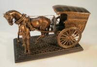 A Ringtons commemorative figure depicting a horse and carriage with a tea seller