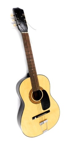 An acoustic guitar, numbered G-101, 95cm long, and case.