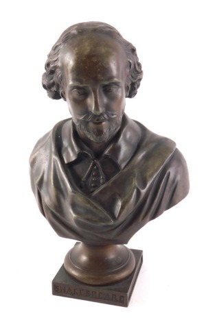 A bronzed spelter bust of William Shakespeare, on a square titled base, 28cm high.