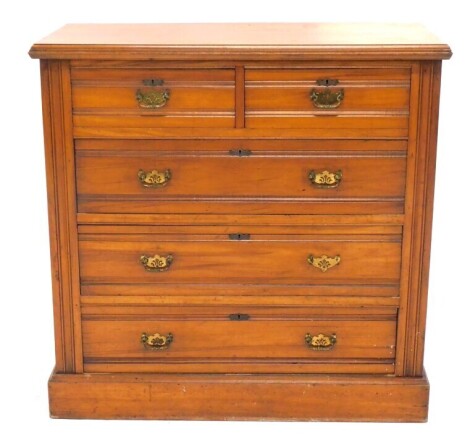 A late Victorian satinwood chest, of two short and three long graduated drawers, with brass handles and plinth base, 102cm high, 104cm wide, 48cm deep.