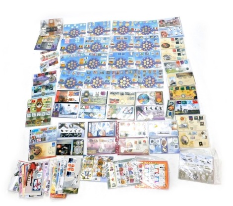 A large quantity of coin covers, to include a number of Euro 2002, various countries, first day covers, etc.